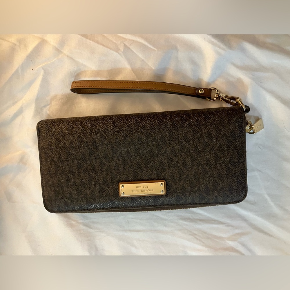 Michael Korrs wallet with hand strap